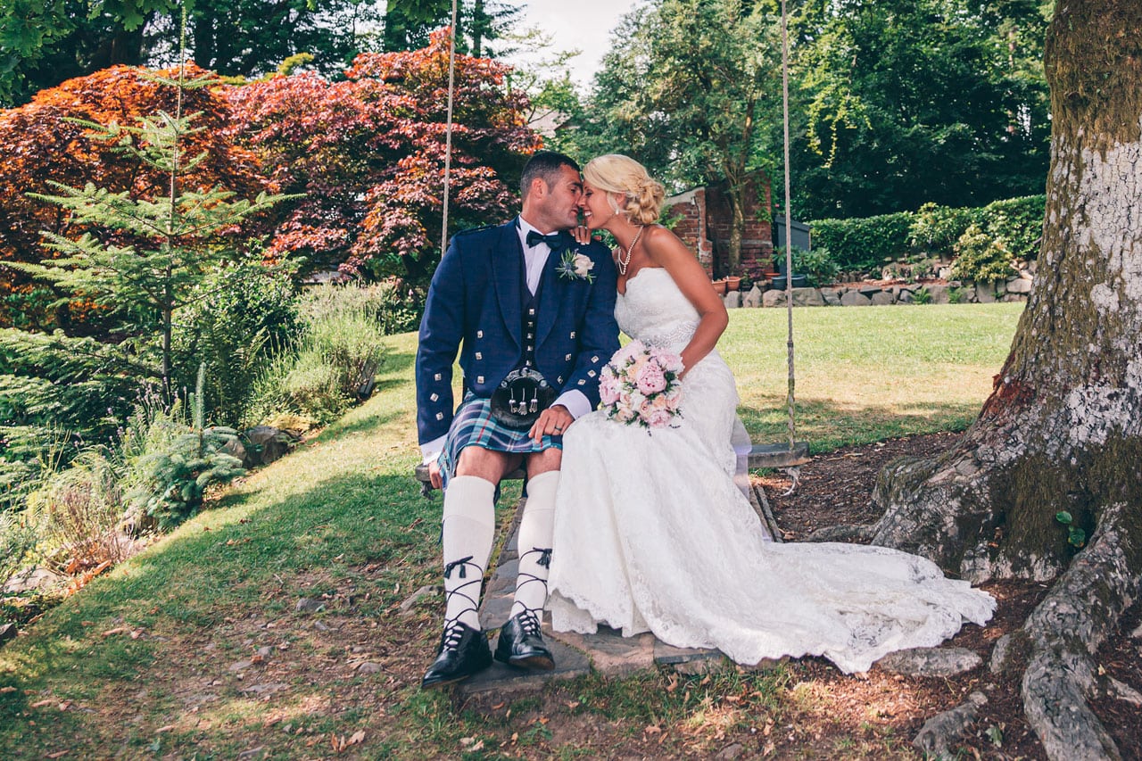 Bride and Groom on swing at Broadoaks Country House
