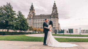 Bride and Groom in front of the Liver Building