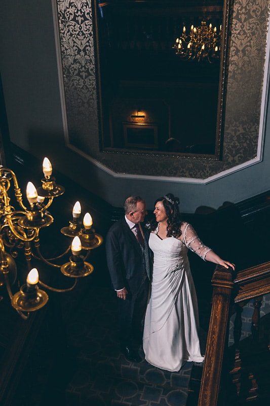 Bride and Groom on the stairs at the Dunkenhalgh