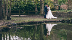 Bride and Groom by the pond