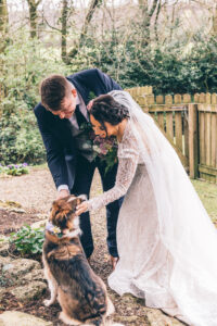 Bride and Groom with their dog at Mitton Hall