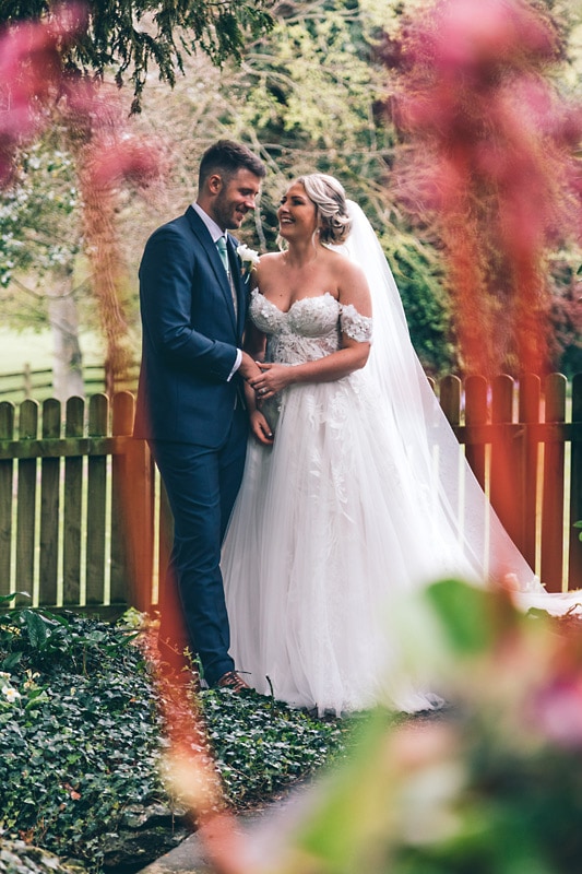 Bride and Groom in the garden at Mitton Hall