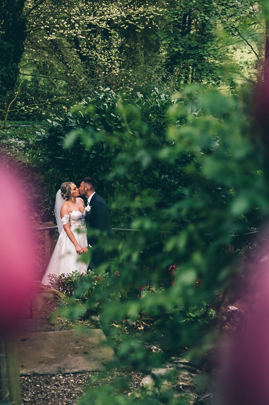 Bride and Groom in the garden at Mitton Hall
