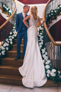 Bride and Groom on the stairs at Spicer Manor