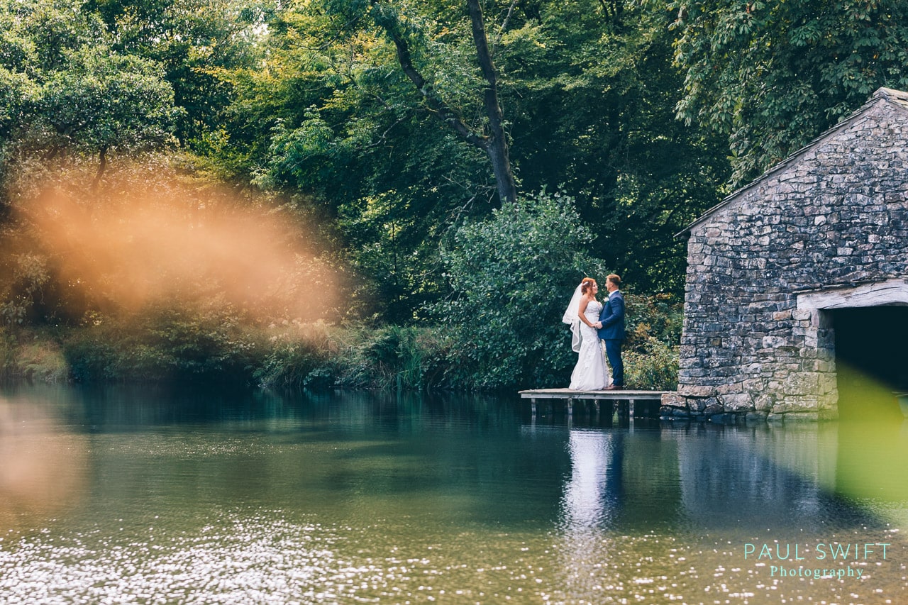 Bride and Groom by the lake at Browsholme Hall