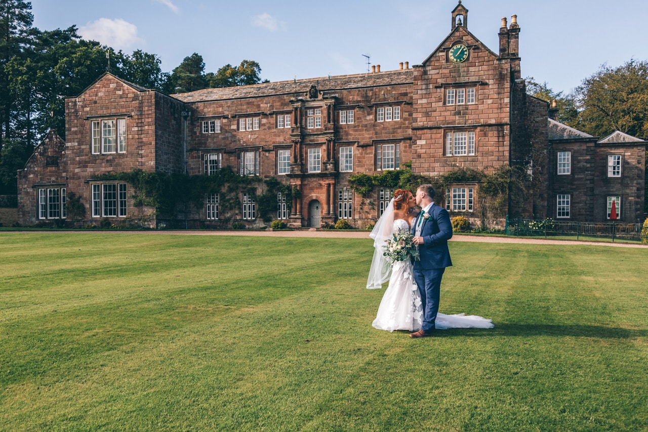 Bride and Groom on the lawn at Browsholme Hall